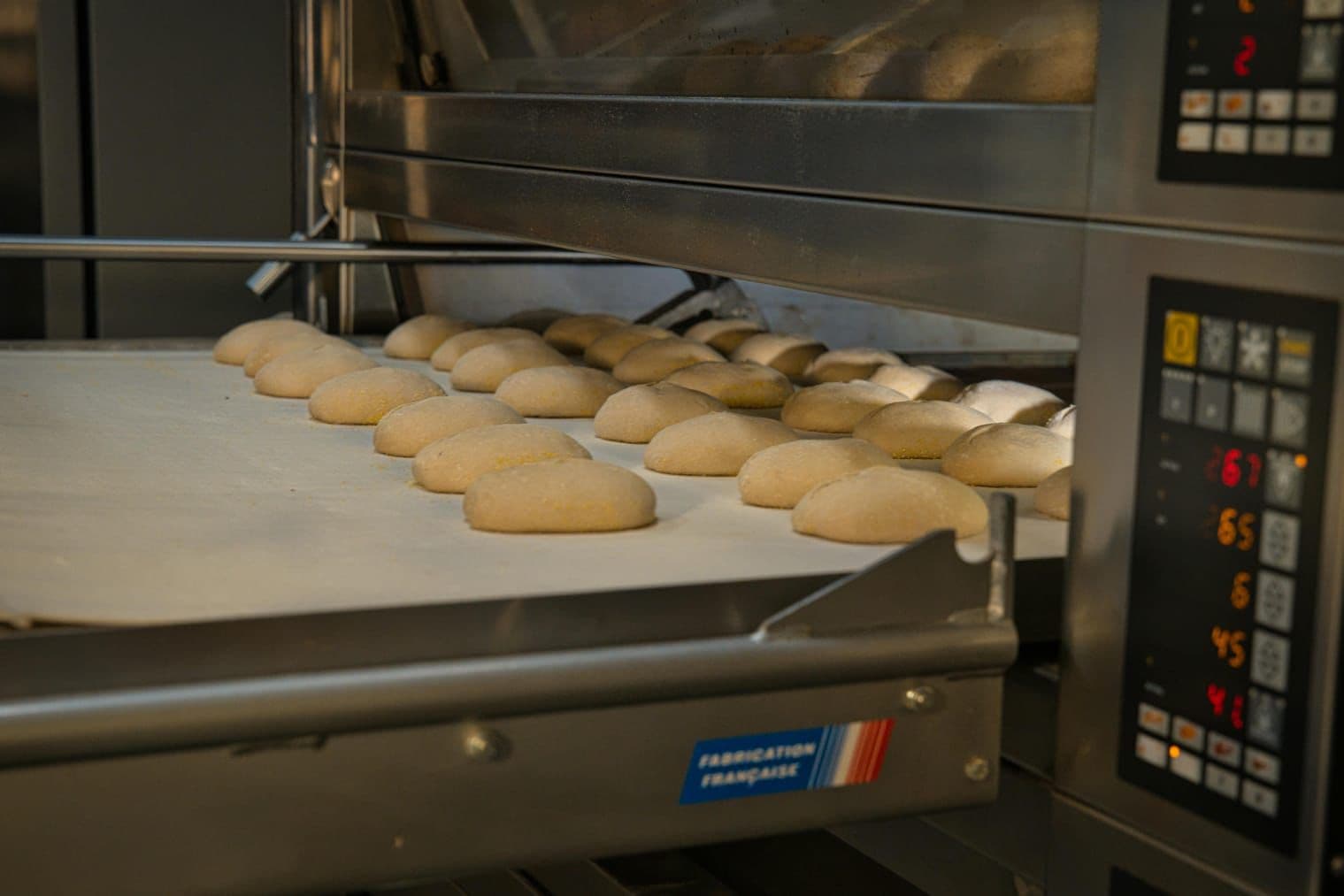 Dough portions baking in a deck oven