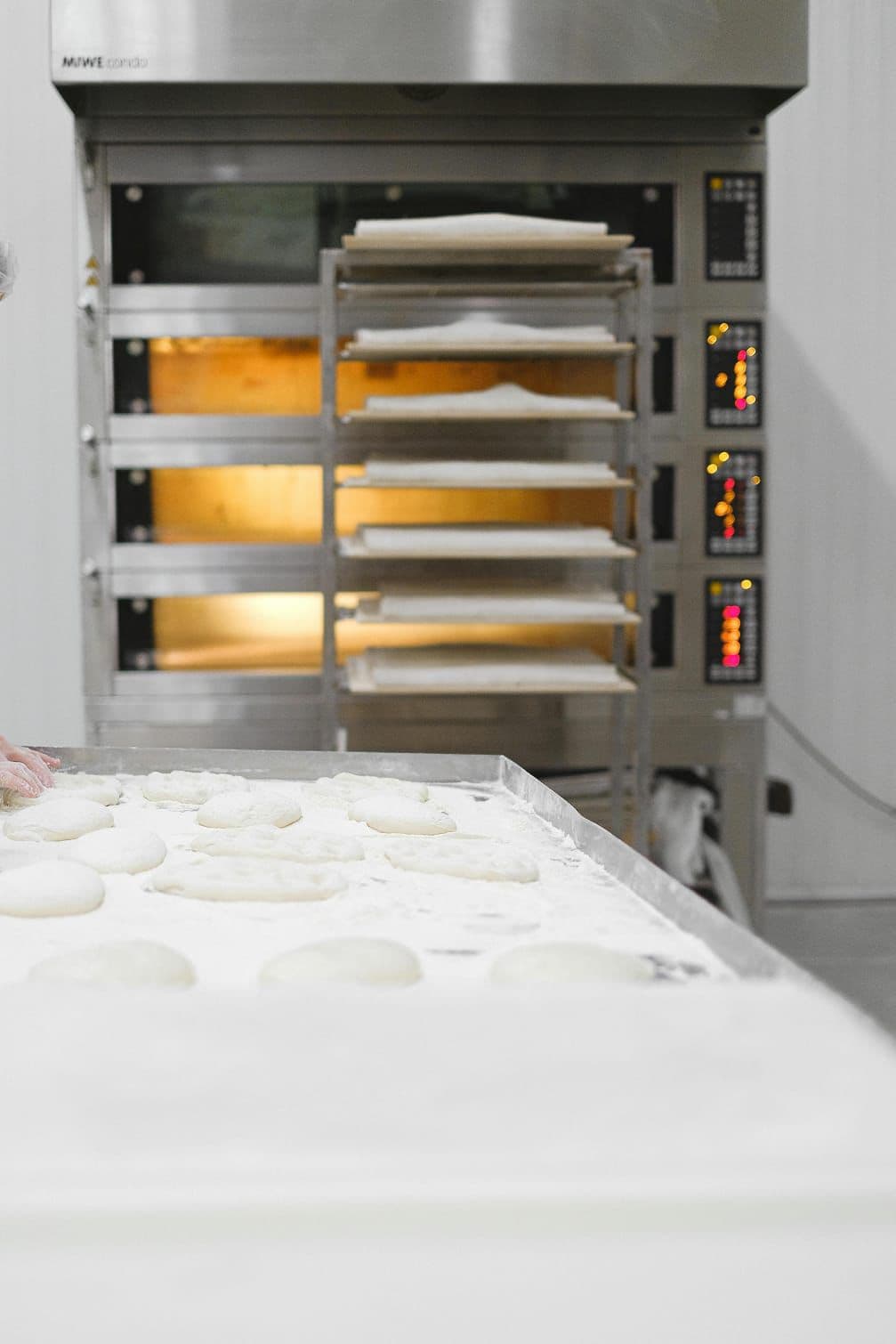 Bakery trays loaded with dough portions